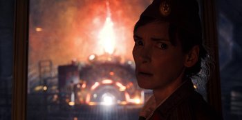 Movie still from “Stranger Things” (2016), created by Ross Duffer – A man in a military uniform looking into the distance; Close Up shot, Over the shoulder angle