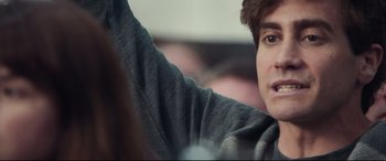 Movie still from “Stronger” (2017), directed by David Gordon Green – A man's face and his arm; Close Up shot, Over the shoulder angle