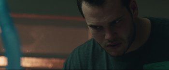 Movie still from “Stronger” (2017), directed by David Gordon Green – A person looking at the camera; Close Up shot, Low angle