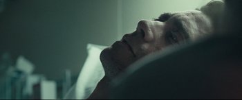 Movie still from “Stronger” (2017), directed by David Gordon Green – A person laying in a bed; Extreme Close Up shot, Low angle