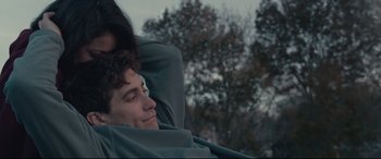 Movie still from “Stronger” (2017), directed by David Gordon Green – A man and a woman wrapped in a blanket; Close Up shot, Low angle