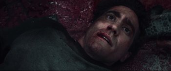 Movie still from “Stronger” (2017), directed by David Gordon Green – A person laying in a bed; Close Up shot, Overhead angle