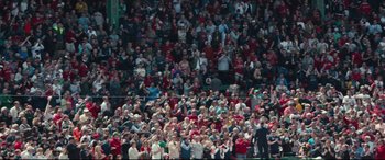Movie still from “Stronger” (2017), directed by David Gordon Green – A crowd of people standing on top of a baseball field; Extreme Wide shot, High angle