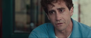 Movie still from “Stronger” (2017), directed by David Gordon Green – A person wearing a blue shirt; Close Up shot, Over the shoulder angle