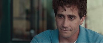 Movie still from “Stronger” (2017), directed by David Gordon Green – A man's face in a blue shirt; Close Up shot, Over the shoulder angle