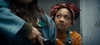Movie still from “Sweet Tooth” (2021), created by Jim Mickle – A young girl looking up at the sky; Close Up shot, Low angle