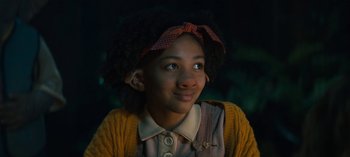 Movie still from “Sweet Tooth” (2021), created by Jim Mickle – A young girl wearing a yellow shirt and a red headband; Close Up shot, Low angle