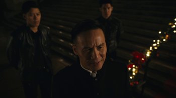 Movie still from “Mr. Robot” (2015), created by Sam Esmail – A group of men standing next to each other in a dark room; Close Up shot, Over the shoulder angle