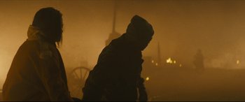 Movie still from “Synchronic” (2019), directed by Justin Benson – A person is standing in the dark in the fog; Medium shot, Low angle