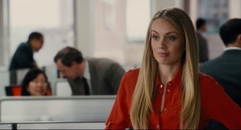 Movie still from “Ted” (2012), directed by Seth MacFarlane – A beautiful blond woman in a red shirt; Close Up shot, Over the shoulder angle