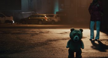 Movie still from “Ted” (2012), directed by Seth MacFarlane – A teddy bear in the middle of a street; Wide shot, High angle