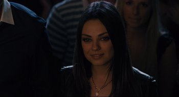 Movie still from “Ted” (2012), directed by Seth MacFarlane – A person with long black hair; Close Up shot, Over the shoulder angle
