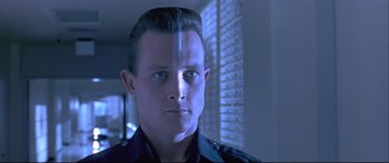 Movie still from “Terminator 2: Judgment Day” (1991), directed by James Cameron – A person wearing a uniform; Close Up shot, Low angle