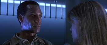Movie still from “Terminator 2: Judgment Day” (1991), directed by James Cameron – A man and a woman are looking at one another; Close Up shot, Low angle