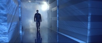 Movie still from “Terminator 2: Judgment Day” (1991), directed by James Cameron – A man walking down a hallway in a building; Wide shot, Low angle