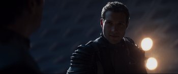 Movie still from “Terminator Genisys” (2015), directed by Alan Taylor – A person wearing a jacket; Close Up shot, Over the shoulder angle