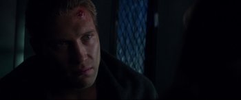 Movie still from “Terminator Genisys” (2015), directed by Alan Taylor – A person with a head injury; Close Up shot, Over the shoulder angle