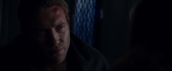 Movie still from “Terminator Genisys” (2015), directed by Alan Taylor – A person with a head injury; Close Up shot, Over the shoulder angle