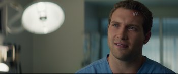 Movie still from “Terminator Genisys” (2015), directed by Alan Taylor – A person wearing a blue shirt; Close Up shot, Over the shoulder angle