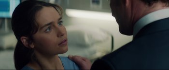 Movie still from “Terminator Genisys” (2015), directed by Alan Taylor – A woman looking at a man in a hospital room; Close Up shot, Over the shoulder angle