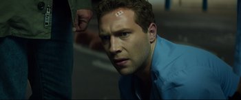 Movie still from “Terminator Genisys” (2015), directed by Alan Taylor – A person wearing a blue shirt; Close Up shot, Low angle