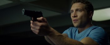 Movie still from “Terminator Genisys” (2015), directed by Alan Taylor – A man holding a hair brush in his hand; Close Up shot, Low angle