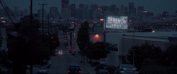 Movie still from “Terminator Genisys” (2015), directed by Alan Taylor – A city street at night lit up by street lights; Extreme Wide shot, High angle