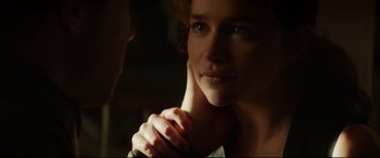 Movie still from “Terminator Genisys” (2015), directed by Alan Taylor – A person with their hands clasped together; Close Up shot, Over the shoulder angle