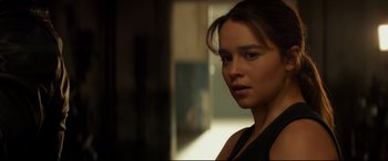 Movie still from “Terminator Genisys” (2015), directed by Alan Taylor – A person wearing a black shirt; Close Up shot, Over the shoulder angle