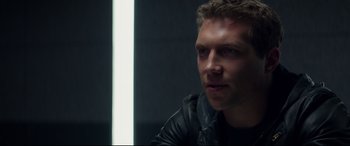 Movie still from “Terminator Genisys” (2015), directed by Alan Taylor – A person wearing a leather jacket; Close Up shot, Over the shoulder angle