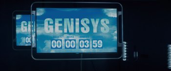 Movie still from “Terminator Genisys” (2015), directed by Alan Taylor – A television screen with the words genisys on it; Extreme Close Up shot, High angle