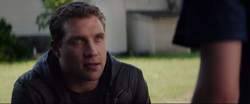 Movie still from “Terminator Genisys” (2015), directed by Alan Taylor – A person wearing a leather jacket; Close Up shot, Over the shoulder angle