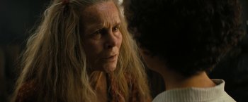Movie still from “Texas Chainsaw Massacre” (2022), directed by David Blue Garcia – An older woman with long blonde hair looking at a younger woman; Close Up shot, Over the shoulder angle