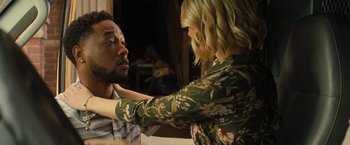 Movie still from “Texas Chainsaw Massacre” (2022), directed by David Blue Garcia – A man and a woman looking at one another; Close Up shot, Over the shoulder angle