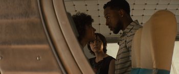 Movie still from “Texas Chainsaw Massacre” (2022), directed by David Blue Garcia – A man and a woman looking at each other in front of a mirror; Close Up shot, Over the shoulder angle