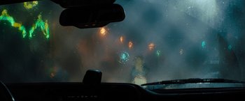 Movie still from “Texas Chainsaw Massacre” (2022), directed by David Blue Garcia – A view from inside a car looking out the windshield; Extreme Close Up shot, Over the shoulder angle