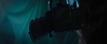 Movie still from “Texas Chainsaw Massacre” (2022), directed by David Blue Garcia – View of a guitar in a dark room; Extreme Close Up shot, Low angle