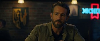 Movie still from “The Adam Project” (2022), directed by Shawn Levy – A person sitting in a room; Close Up shot, Over the shoulder angle