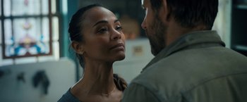 Movie still from “The Adam Project” (2022), directed by Shawn Levy – A man and a woman standing next to each other; Close Up shot, Over the shoulder angle