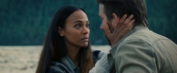 Movie still from “The Adam Project” (2022), directed by Shawn Levy – A man and a woman looking at one another; Close Up shot, Over the shoulder angle