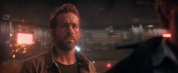 Movie still from “The Adam Project” (2022), directed by Shawn Levy – A person wearing a jacket; Close Up shot, Over the shoulder angle