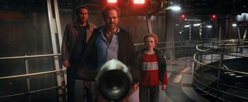 Movie still from “The Adam Project” (2022), directed by Shawn Levy – A group of men standing next to each other; Medium shot, Low angle