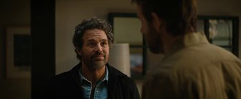 Movie still from “The Adam Project” (2022), directed by Shawn Levy – A man with a goatee is talking to another man; Close Up shot, Over the shoulder angle