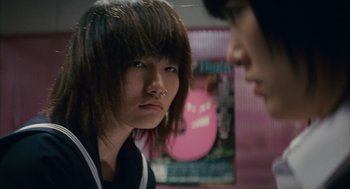 Movie still from “Babel” (2006), directed by Alejandro G. Iñárritu – Two young people are looking at one another; Close Up shot, Over the shoulder angle