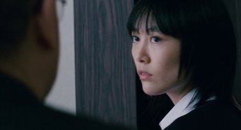 Movie still from “Babel” (2006), directed by Alejandro G. Iñárritu – A young asian woman looking into the distance; Close Up shot, Over the shoulder angle
