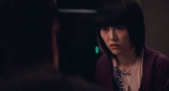 Movie still from “Babel” (2006), directed by Alejandro G. Iñárritu – A young asian woman sitting in front of a mirror; Close Up shot, Over the shoulder angle
