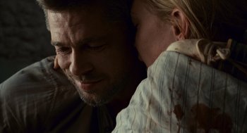 Movie still from “Babel” (2006), directed by Alejandro G. Iñárritu – A person holding a child; Close Up shot, Over the shoulder angle