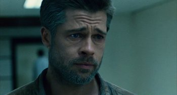 Movie still from “Babel” (2006), directed by Alejandro G. Iñárritu – A person with a beard; Close Up shot, Over the shoulder angle