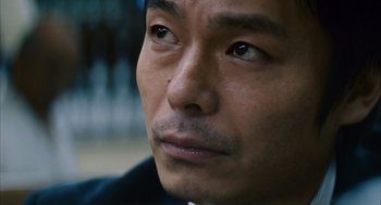 Movie still from “Babel” (2006), directed by Alejandro G. Iñárritu – A man's eyes and face; Extreme Close Up shot, Low angle
