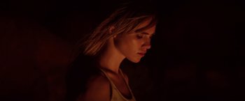 Movie still from “The Bad Batch” (2016), directed by Ana Lily Amirpour – A beautiful young woman with long blonde hair; Close Up shot, Low angle